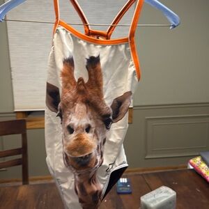 Q swimwear giraffe suit
Size 26